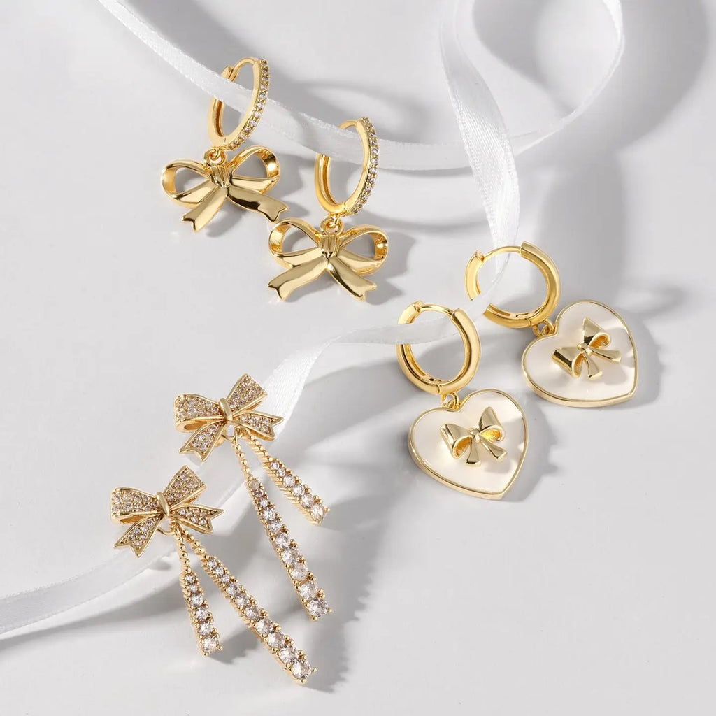 Bow Accented Heart Huggies