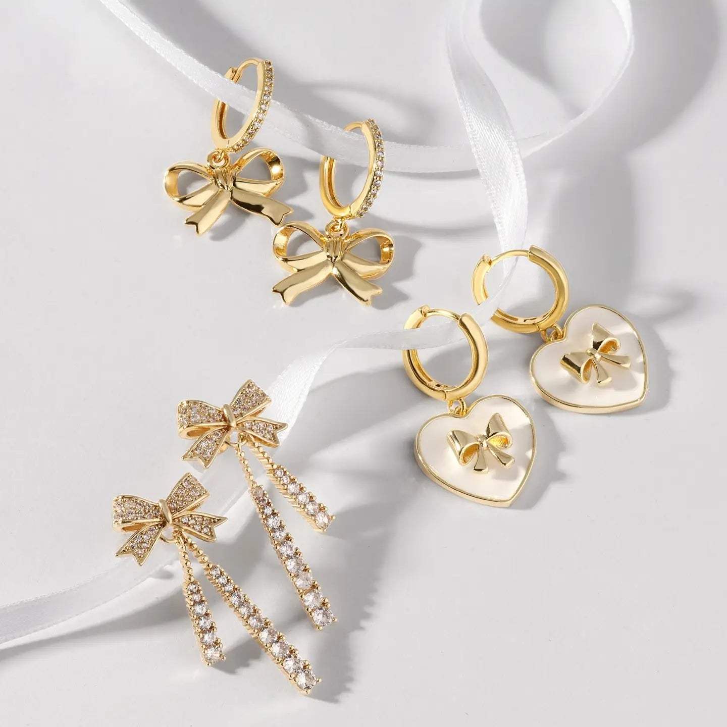 Bow Accented Heart Huggies