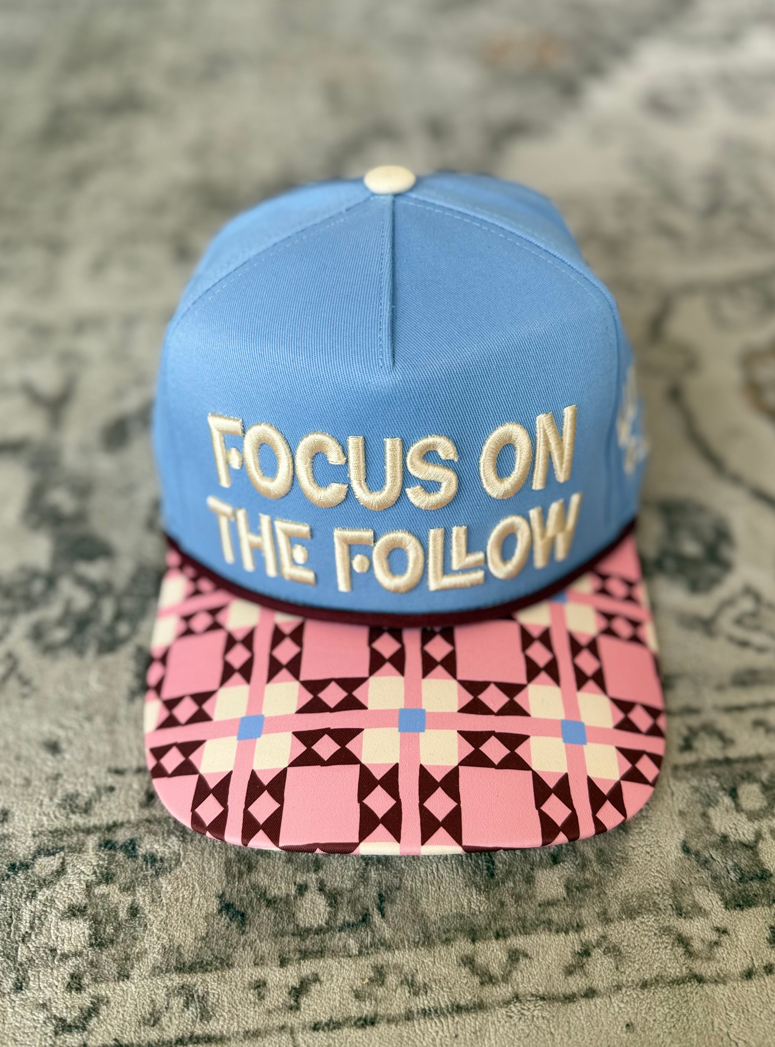 Focus On The Follow Trucker Hat
