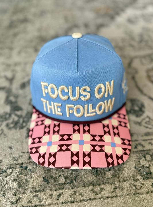 Focus On The Follow Trucker Hat