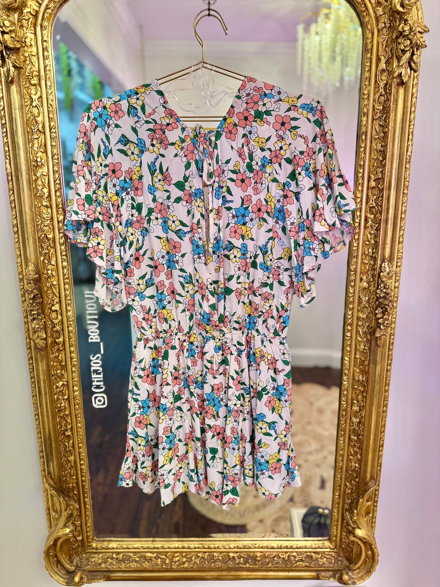 Peachy Keen Floral Ruffle Sleeve Romper