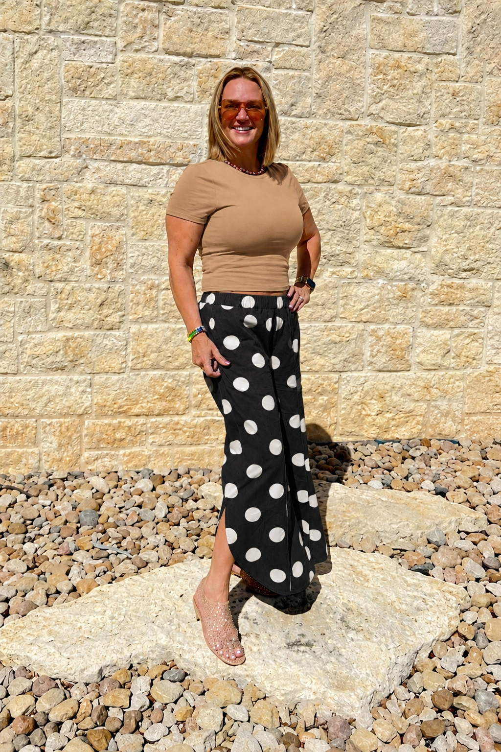 Camel shirt with black and white polka dot bottoms
